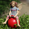 Jordan Mini Fairy Sitting on Hop Ball: Backyard Miniature - Baby Feathers Gift Shop