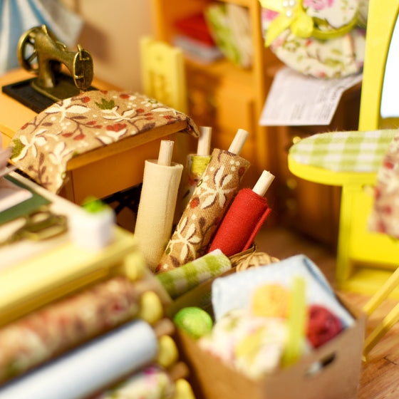 Lisa's Tailor Shop Dollhouse Miniature DIY Kit: Mini Village Kit - Baby Feathers Gift Shop
