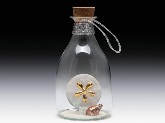 Sand dollar in bottle. - Baby Feathers Gift Shop
